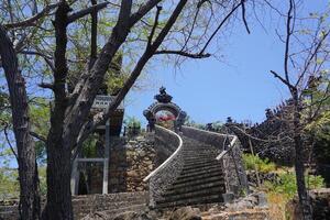 A stone staircase leading up to a building photo