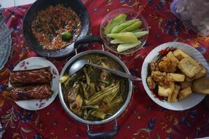 A table with food and utensils on it photo