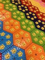 colorful floor with lots of different colored tiles photo