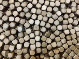 A close-up view of a collection of small round pieces of wood for children's toys. suitable for background photo