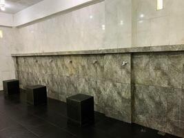 A clean room in the mosque where water for ablution is taken. photo
