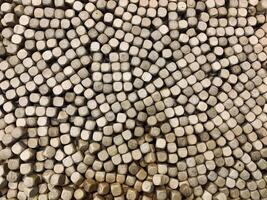A close-up view of a collection of small round pieces of wood for children's toys. suitable for background photo
