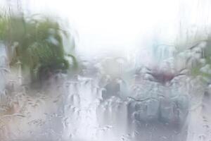 abstract texture of water falling on the glass photo