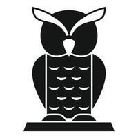 Wise owl standing on a tree branch icon vector