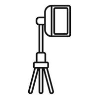 Studio spotlight standing on tripod for professional lighting setup vector