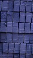 Pile of paving block, grey abstract textured background, copy space photo