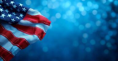 A blue background with a red and white American flag. The flag is waving in the wind. The flag is the main focus of the image photo