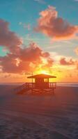Lifeguard building tower on beach with sunset sky and marine photo