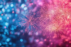 Pink and blue festive background with sparkling fireworks exploding photo