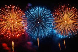 Colorful fireworks exploding in the night sky photo