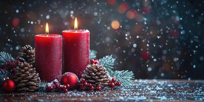 dos iluminado rojo Navidad velas ardiente en Nevado mesa con pino conos foto