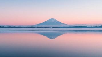 Mount Fuji Reflected in a Frozen Lake at Sunrise photo