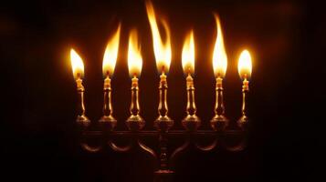 Seven Candles Burning in a Golden Menorah photo