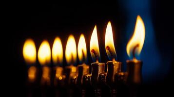 Close-up of Burning Candles on a Menorah photo