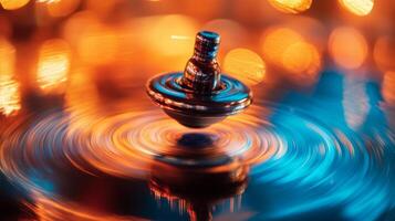A Spinning Top with a Blurred Background of Orange and Blue Lights photo