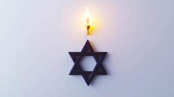 A Lit Candle Above a Star of David photo