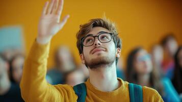 Young Man with Glasses Raising His Hand in a Classroom photo