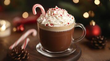 Hot Chocolate with Whipped Cream, Candy Cane, and Sprinkles photo