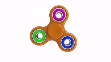 Colorful 3D fidget spinner rotating on white surface video