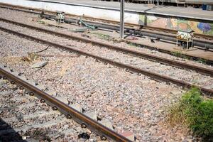 View of train Railway Tracks from the middle during daytime at Amritsar railway station in India, Train railway track view, Indian Railway junction, Heavy industry photo