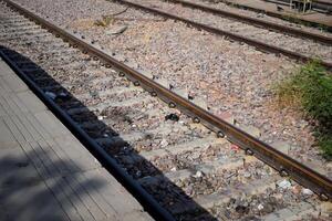 View of train Railway Tracks from the middle during daytime at Amritsar railway station in India, Train railway track view, Indian Railway junction, Heavy industry photo