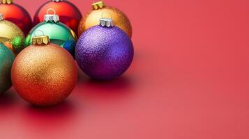 Colorful Christmas ornaments on a red background with space for festive text photo