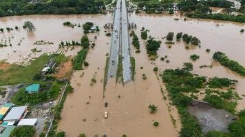 Aerial view of Chiang Rai downtown flooding by Kok river after heavy rain. This river is the blood line for people of Chiang Rai, started from the hills on boarder of Myanmar. photo