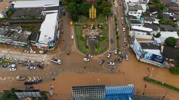 Chiang Rai, Thailand - 13-September-2024 - Aerial view of King Mengrai monument landmark in the heart of Chiang Rai downtown after typhoon Yagi has swept Chiang Rai province of Thailand. photo