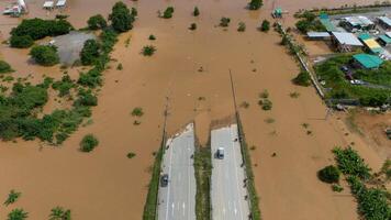 Aerial view of car stuck on the bridge after road flooded during typhoon Yagi has swept Southeast Asia. photo