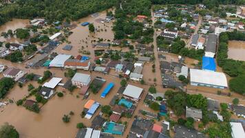 Aerial view of suburb area in Chiang Rai downtown flooding by Kok river after typhoon Yagi has swept Southeast Asia. photo