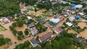 Aerial view of Chiang Rai downtown flooding by Kok river after typhoon Yagi has swept Southeast Asia. photo