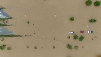 Aerial view of broken cars on road flooded during typhoon Yagi has swept Southeast Asia. photo