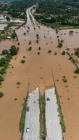 Aerial view of car stuck on the bridge after road flooded during typhoon Yagi has swept Southeast Asia. photo