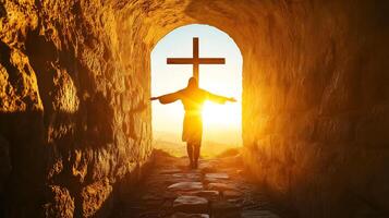 The resurrection of Jesus at the empty tomb with sunlight shining through the archway photo