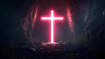 The glowing cross within the empty tomb signifying the resurrection of Jesus Christ photo