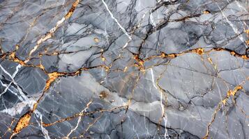 Elegant gray marble texture with gold veining showcasing natural beauty and luxury design elements photo