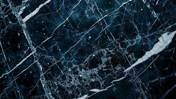 Dark marble texture with contrasting white veins suitable for background or design elements photo