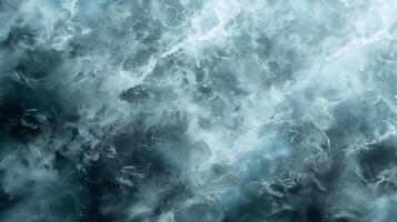 Dynamic marble texture background with fluid patterns and hues reminiscent of ocean waves photo