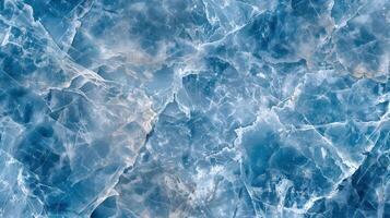 Close-up view of a blue marble texture background featuring intricate patterns and a glossy finish photo
