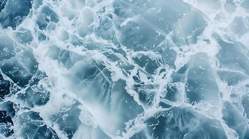 Serene marble texture background showcasing gentle waves in cool blue tones with soft veining photo