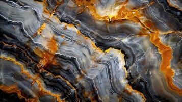 Natural marble texture background with intricate patterns in gray and gold tones photo