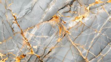Elegant marble texture background with golden veins in a subtle gray and white pattern photo