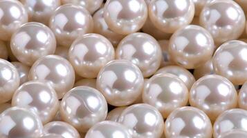 Collection of lustrous pearl beads on a soft, elegant background during a bright daylight setting photo