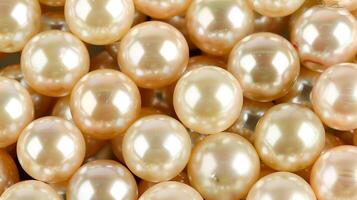 Close-up view of lustrous pearls scattered on a neutral background for artistic display photo