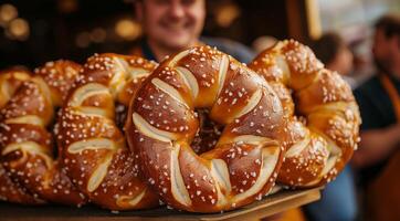 Pretzels on a wooden table on a dark background with space for text photo