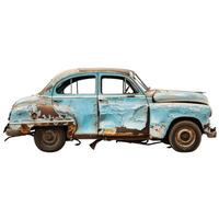 Old rusty blue car isolated showing its age and decay photo