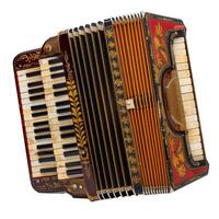 Antique accordion lying open showing keyboard and bellows photo