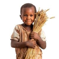 Young child smiling with wheat bundle photo