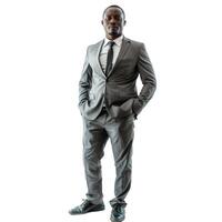 Confident businessman standing with hands in pockets on white background photo