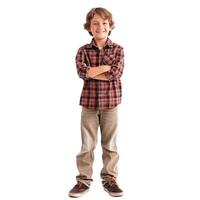 Happy young boy posing with arms crossed photo